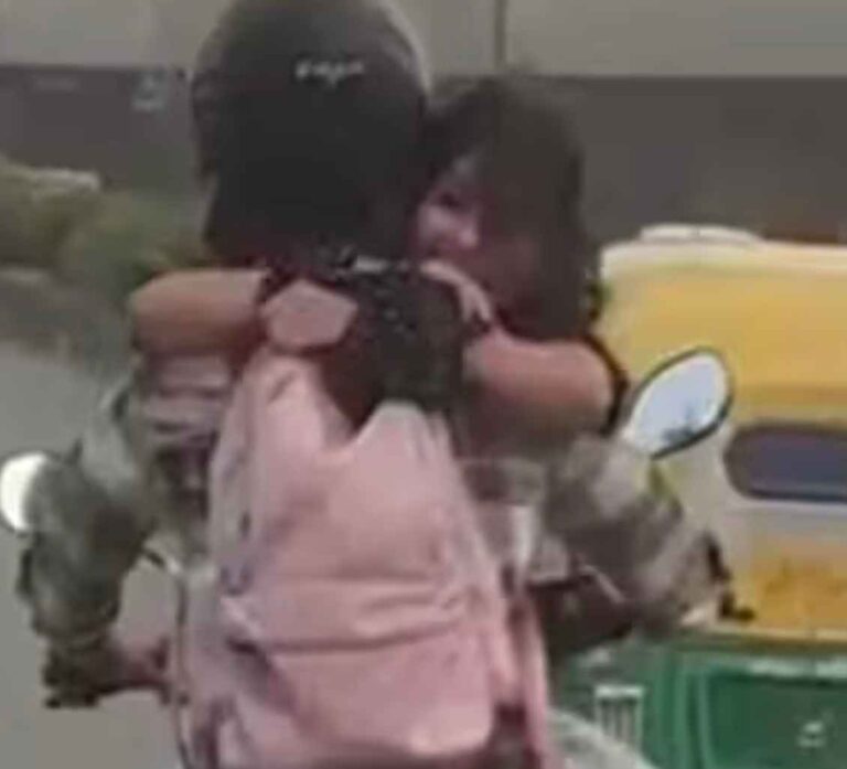 New Delhi: कटा 11 हजार का चालान-चलती बाइक पर चालक के गले लगी महिला